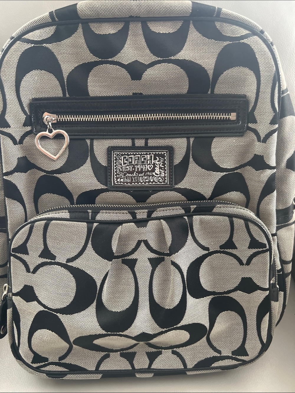 Coach Poppy Signature Canvas Logo Backpack in Black